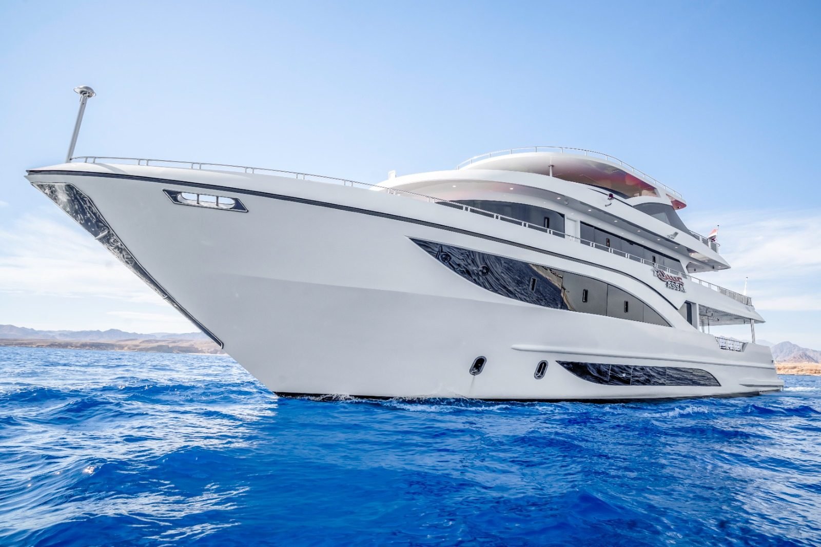The bow of Assal 2 over deep blue water