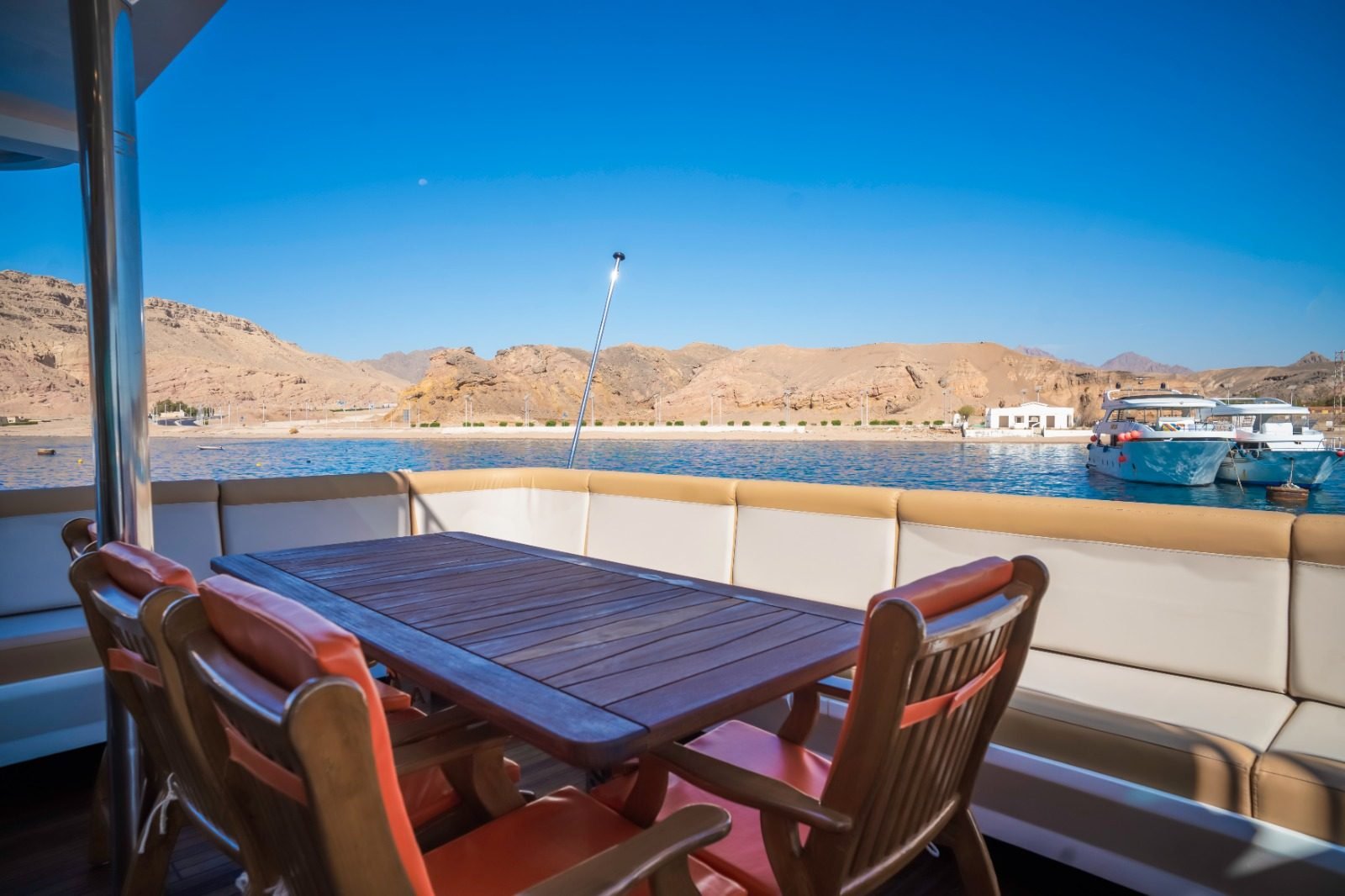 Aft-deck dining table with Sinai mountain views